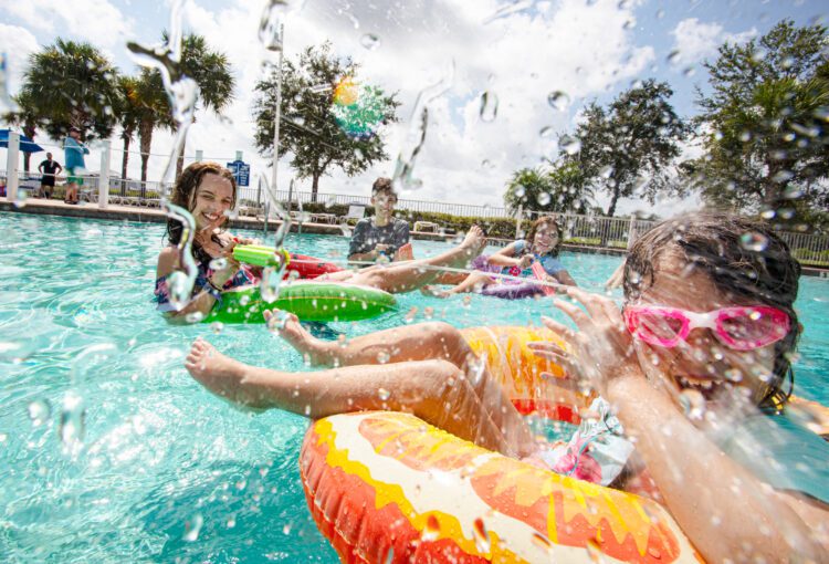 Ave Maria residents play in the pool at the Ave Maria Water Park