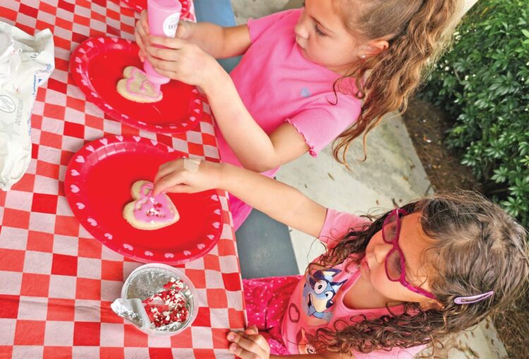 Kids decorating cookies