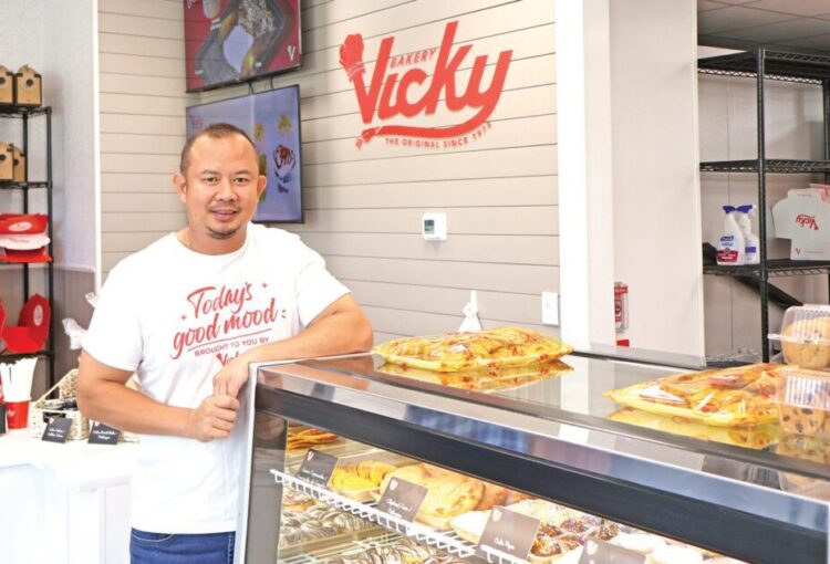 Man inside Vicky Bakery