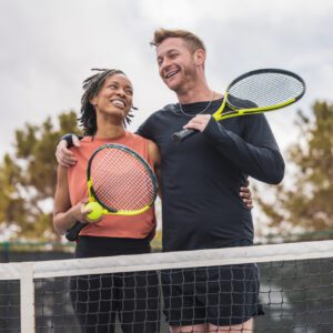 A couple playing mixed doubles
