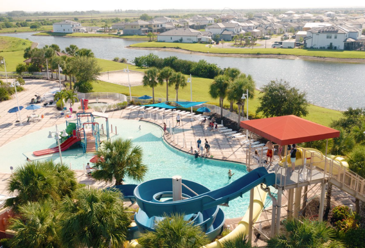 Avalon Park by Pulte Homes is located in close proximity to the Ave Maria Water Park; aerial of new construction homes and water park.