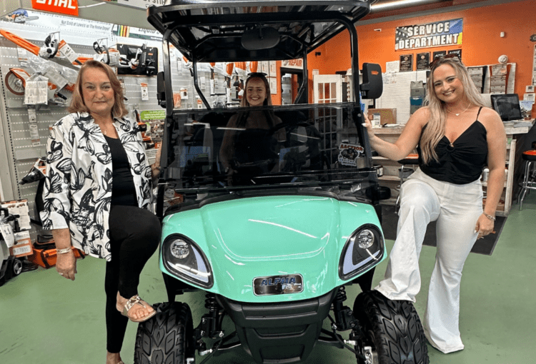 Gagne Family, winners of golf cart from Ave Maria 2024 Door to Door Model Home Tour event