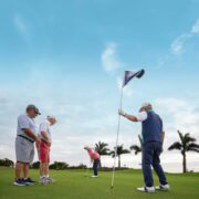 Golfers play the course at The National Golf & Country Club